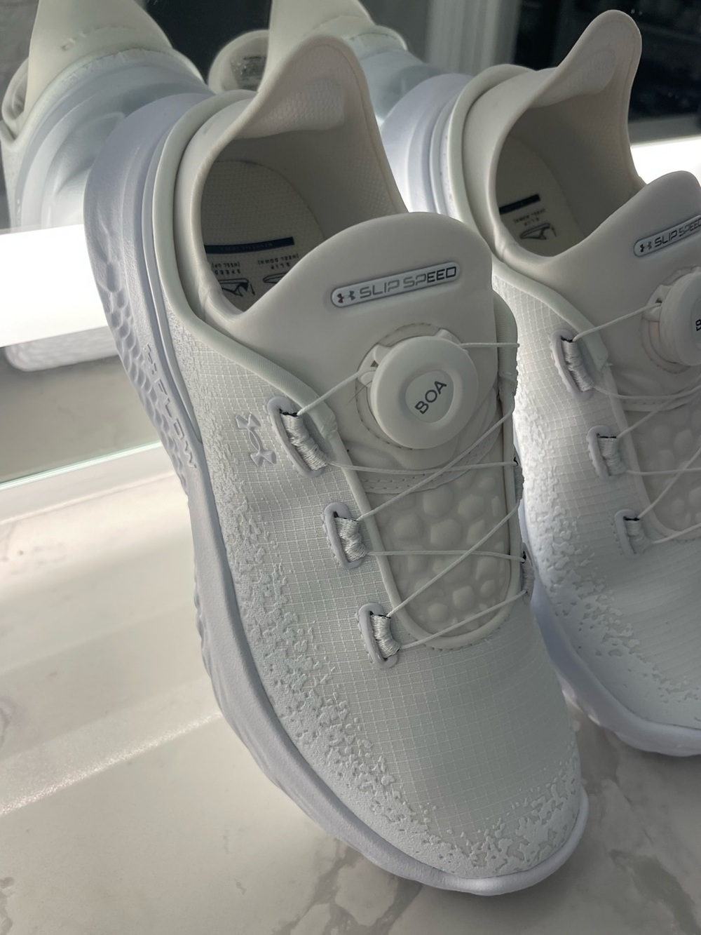 GOAT Under Armour’s Unisex W8 or M6.5 White SlipSpeed Knit Dial Running Shoes